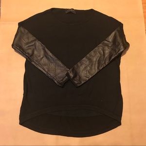 Akira - Sweater w/ faux leather sleeves.